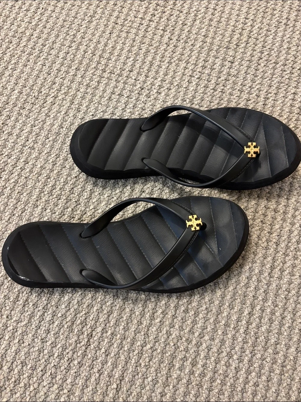 Tory Burch Black Flip Flops with Gold Logo Accent